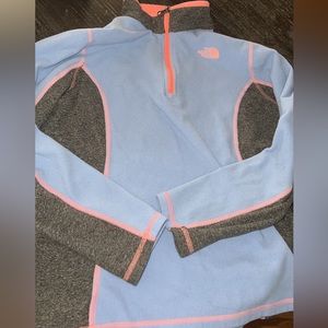 Girls north face in good condition the colors are grey,coral,and periwinkle.